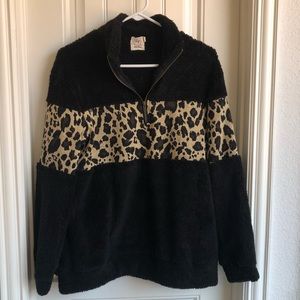 Black and leopard pull over